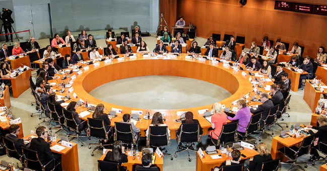 Chancellor Angela Merkel and young people at the Federal Chancellery