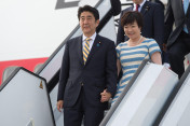 Japanese Prime Minister Shinzo Abe and his wife Akie Abe arrive at Munich Airport on 6 June 2015