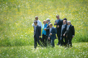 The G7 leaders and EU representatives on their way to their first working session after the group photo
