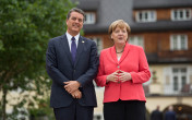 Chancellor Angela Merkel welcomes the Director-General of the World Trade Organization (WTO), Roberto Azevêdo, in front vor Schloss Elmau