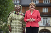 Federal Chancellor Angela Merkel greets African Union Commission Chairperson Nkosazana Dlamini Zuma in front of Schloss Elmau