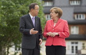 Federal Chancellor Angela Merkel greets UN Secretary-General Ban Ki-moon in front of Schloss Elmau