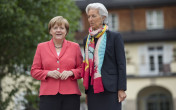 Chancellor Angela Merkel welcomes Christine Lagarde, Managing Director of the International Monetary Fund (IMF), in front of Schloss Elmau