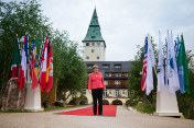 Chancellor Angela Merkel during the welcome ceremony for the outreach guests in front of Schloss Elmau