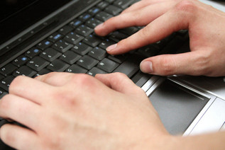 Hands on a keyboard