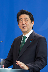 Shinzo Abe, Prime Minister of Japan, during a press conference in the Federal Chancellery